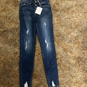 Women's Distressed Blue Jeans